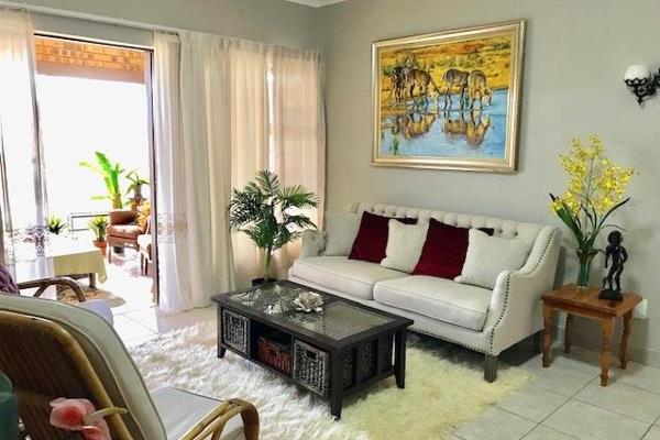 Nestled in the secure and friendly community of Bateleur Estate, this low-maintenance ...