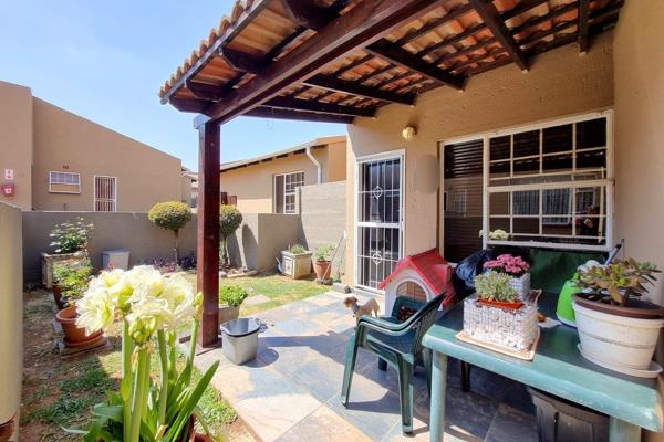 This stunning simplex townhouse is positioned within Rose Gardens security complex and ...