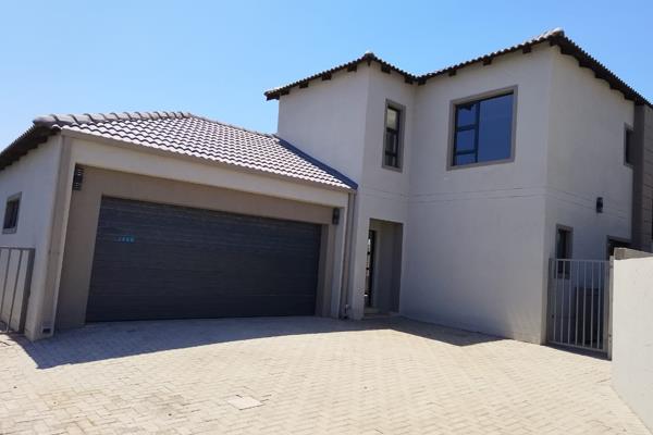 Real Dignified Properties welcomes you to your dream home, nestled in Zambezi Lifestyle Manor estate. This exquisite four-bedroom ...