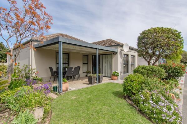 Lovely sunny 2 bedroom house in Helderberg Manor. Each bedroom has it&#39;s own bathroom. Kitchen is well equipped with ample ...