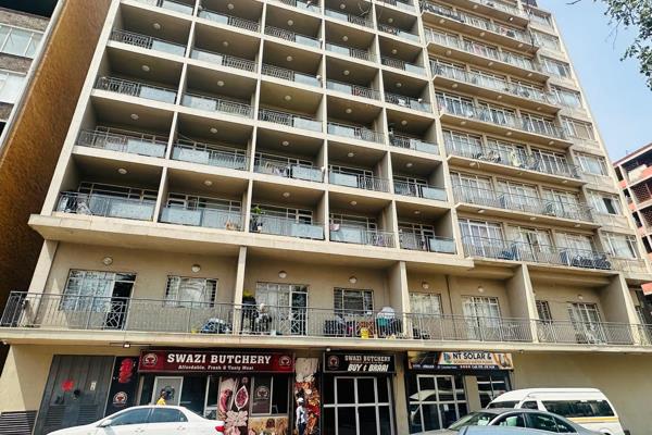 This impressive block of flats is located in the heart of town, close to all major amenities, schools, and public transportation ...