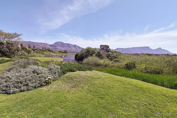 Magnificent mountain and peaceful lake views from this north-facing secure home situated on an inaccessible shoreline of the Zandvlei ...