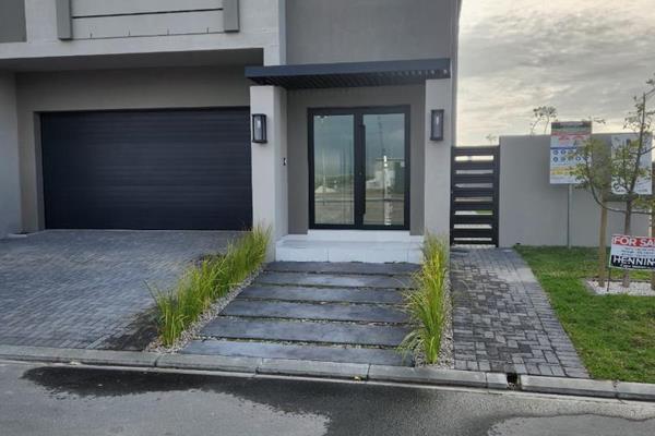 Nestled in the serene setting of Maskew Street, Sandown, Blouberg, Cape Town, this ...