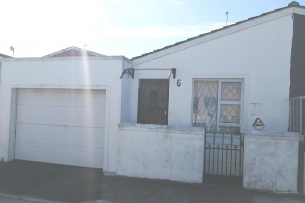 This rental property in Portlands, Mitchell&#39;s Plain, offers a comfortable and secure ...