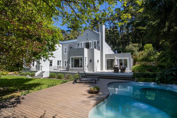 Tucked away in a serene, tree-lined cul-de-sac where homes seldom become available, this breathtaking family residence in Upper ...