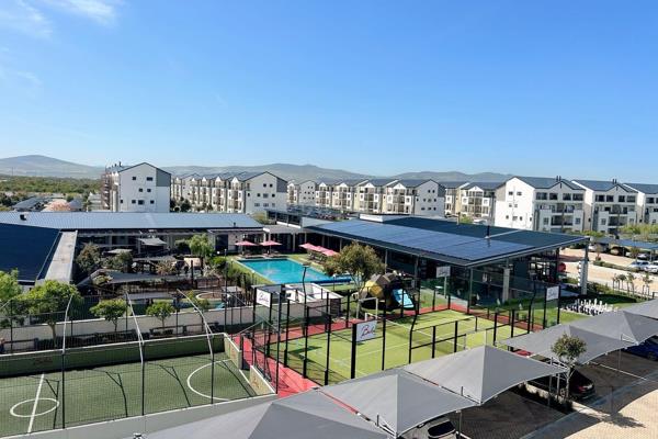 Prepare to be captivated by this stunning double-volume penthouse at Fynbos Lifestyle Estate, where panoramic views and breathtaking ...