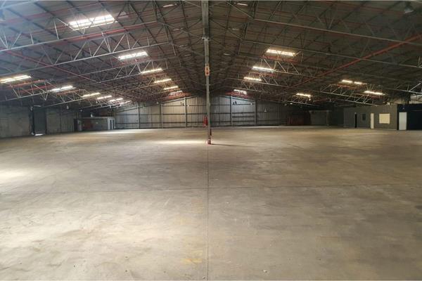 A spacious 7459m2 warehouse is available for lease in a secure industrial complex ...