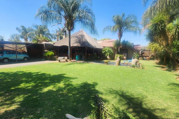 Family home with a pool........... Montana gardens!!!

This full-title home offers 3 ...