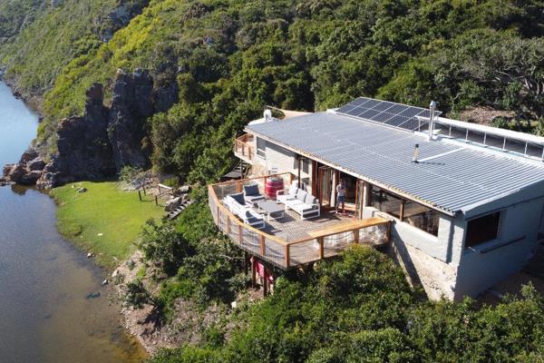 Antiquated River House on the Blind River Estuary – A Century of Secluded Charm with unobstructed changes for a major expansion on this ...