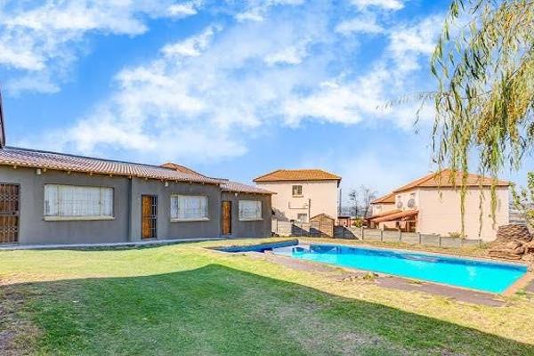 Bachelor room with shower, toilet and a kitchenette . The property has remote controlled ...