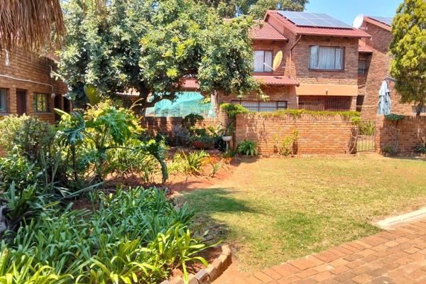 Spacious Open Plan Dining &amp; Lounge leading to the covered Patio, built in braai and private area where you can spend time with ...