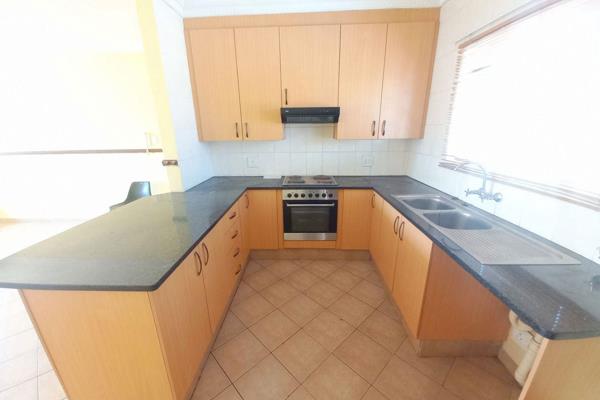 This apartment offers an open plan spacious kitchen with granite tops and a sitting room with a sliding door leading outside to the ...