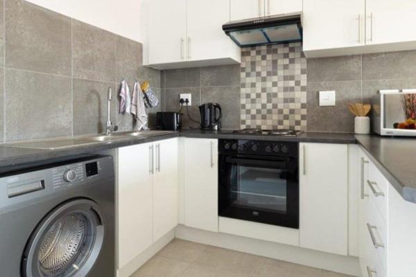 Enjoy this modern duplex apartment with an open-plan living area from the kitchen. 
The ground floor consists of the living area ...