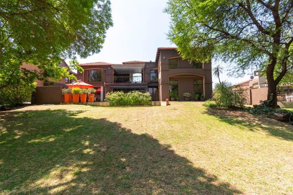 This stunning home, exclusively listed by Belinda Kriel for R4,950,000, is nestled ...