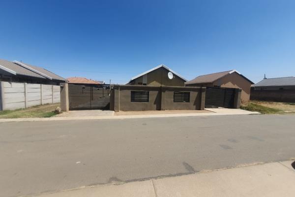 Welcome to this inviting home featuring an open-plan lounge and kitchen, elegantly designed and neatly tiled for a modern feel. The ...