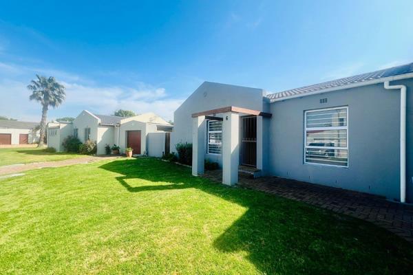 This neat and spacious home is perfect for family living!

The heart of the home is found in the open plan kitchen, dining room ...