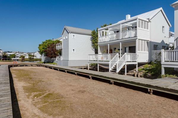 Nestled in an excellent location, this compact yet stylish home offers a unique blend of canal and beachside living. 

Designed with an ...