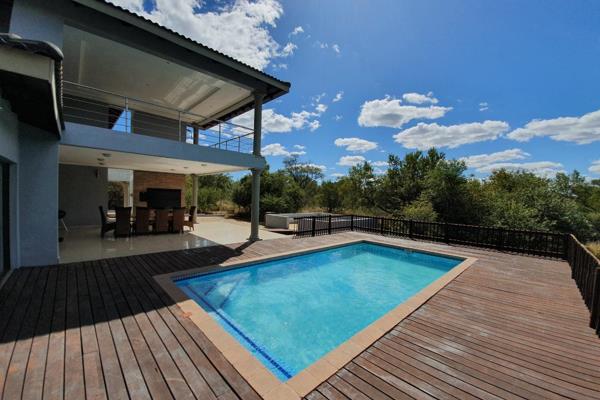 Discover your own slice of paradise in this exquisite 7-bedroom, 5-bathroom residence nestled in the prestigious Hoedspruit Wildlife ...