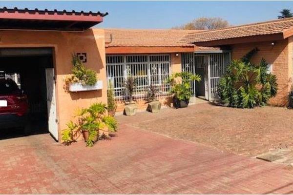 Very secure house with camera system, beams and alarm system.  Jojo tank, electroc fence, pre-paid electricity with a Hydroponic system.  Laundry, sunroom and a study.