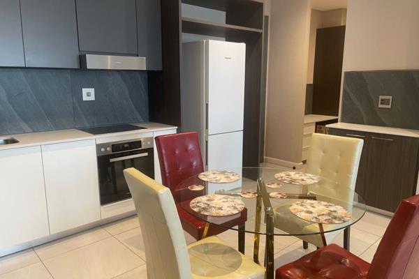 Nestled in the heart of Menlyn Maine, this exquisite fully furnished large two bedroomed apartment offers an exceptional living ...