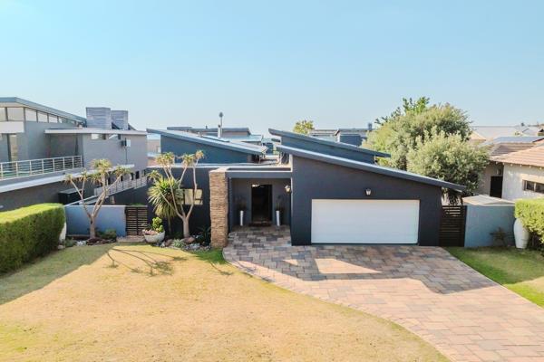 The heart of the home is an open-plan layout that includes a spacious kitchen, complete with a separate scullery, making meal ...