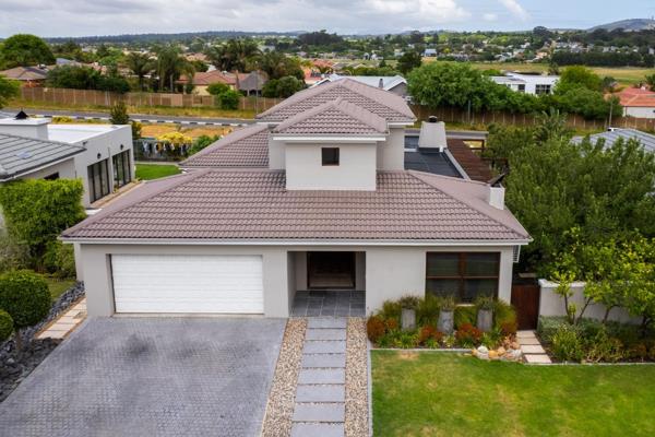 Explore your ideal residence within the prestigious Graanendal Estate, where opulent living seamlessly blends with safety and tranquillity. This captivating double-story home harmonizes sophisticated design with contemporary ...