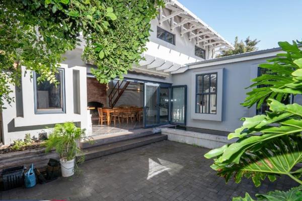 Welcome to this architecturally designed 3-bedroom, 2-bathroom home in the heart of ...