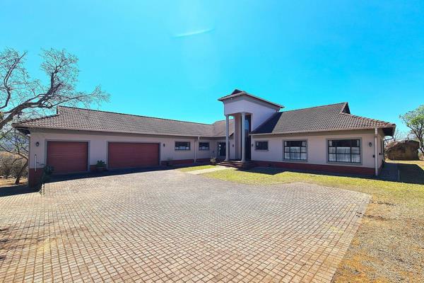 Experience the ultimate bushveld lifestyle in this meticulously custom-built home ...