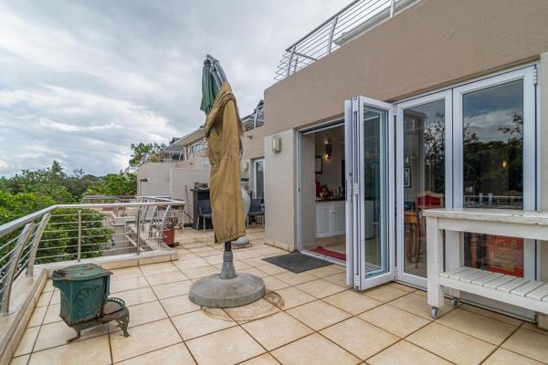 SOLE MANDATE: With tranquil views over the communal swimming pool, this three-bedroom ...