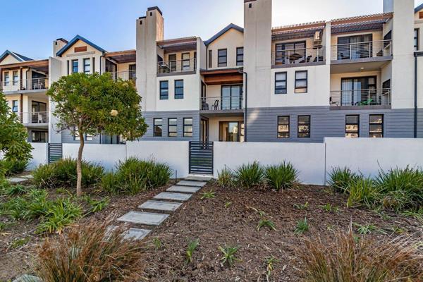 Step into this beautifully designed ground-floor apartment that offers both style and ...