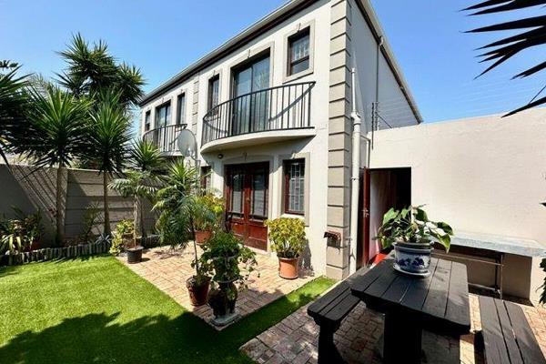 Discover this beautifully situated townhouse in an upscale secure complex in Parklands, offering easy access to all major ...