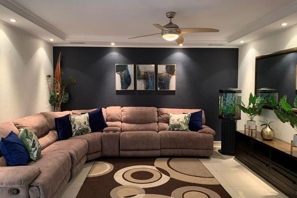 Step into a world of warmth and comfort in this lovely three-bedroom, three-bathroom home. As you enter, you&#39;ll be greeted by a ...
