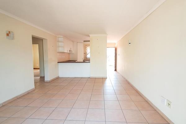 This modern 2-bedroom, 2-bathroom townhouse in Olympus offers an open-plan kitchen ...