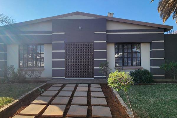 Located in one of Laudium&#39;s most desired areas, this large and spacious home offers versatility, comfort, and style. With 5 ...