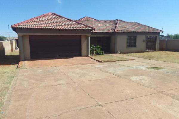 Four bedrooms, main bedroom furnished with BIC and En-Suite containing bath and shower wall tiled to the ceiling, the other three  ...