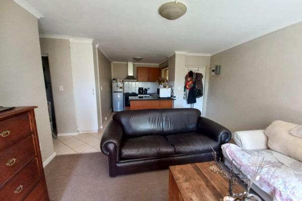 Secure 2 Bedroom,  2 Bathroom unit with open plan kitchen and lounge, balcony with braai ...