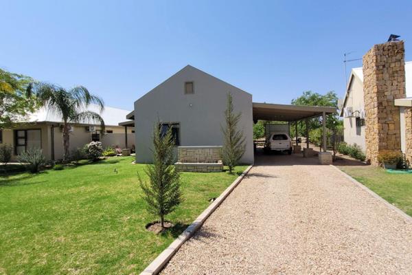 This beautiful 2 bedroom 2 bathroom home situated in a security estate is within walking distance from the Orange River. The property ...