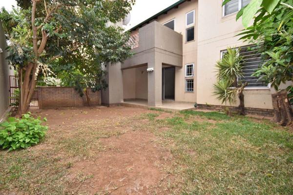 This lovely ground floor unit showcases a newly tiled covered patio with built in braai ...