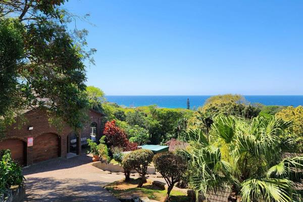 This spacious family home, set in park-like gardens with stunning sea views, offers a ...