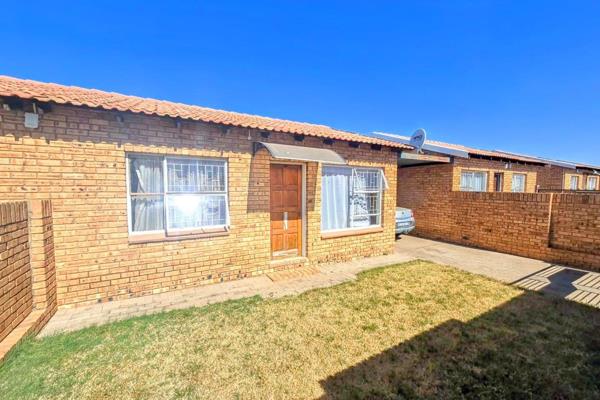 This two-bedroom townhouse offers a cozy, modern living space perfect for small families or couples. 
The open-plan TV room seamlessly ...