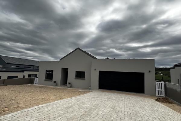 Experience the ultimate in secure living in this modern home situated within the popular Rheebok Village Estate in Reebok, with ...