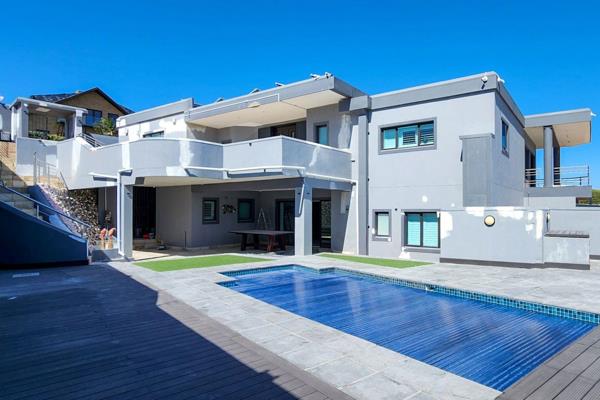 A two-storey Villa with a rooftop terrace wrapped within Table Bay sea views offers
a private pool, five bedrooms, all en-suite and two ...