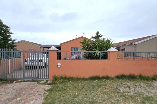 Introducing this well maintained 4 bedroom home in Scottsdene, Kraaifontein close to a ...