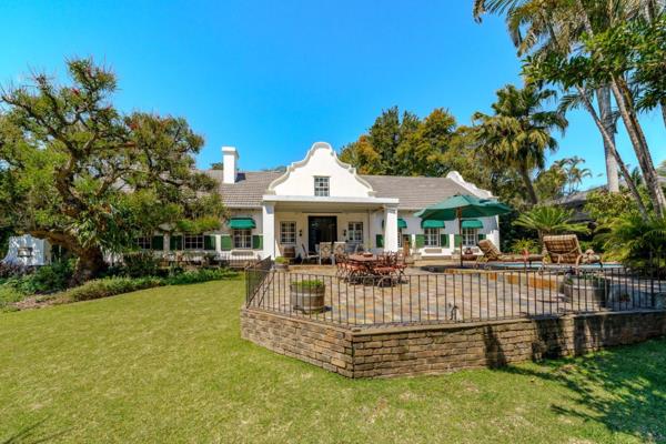 A Characteristic Cape Dutch Home with 4 bedrooms on a beautiful 2000m2 stand in one of ...