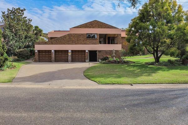 Proudly and exclusively presented by HOWELL Properties is this four-bedroom face-brick ...