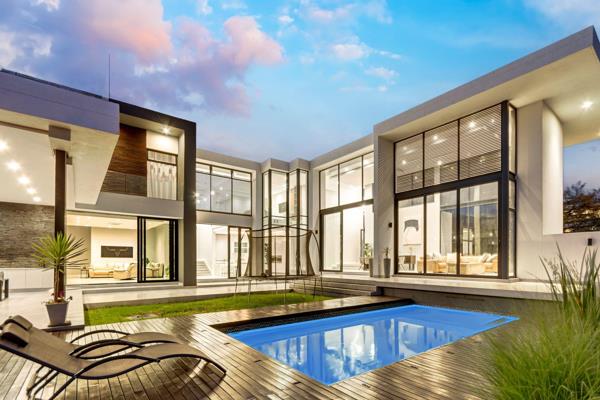 Discover modern luxury in this stunning 4-bedroom, 4-bathroom home that embodies architectural brilliance and high-end living in Steyn ...