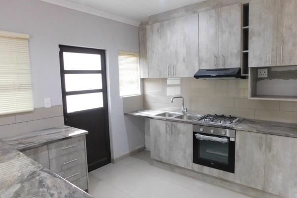 This Unfurnished 3-bedroom home invites you into a spacious living area which leads to the kitchen. Living room and kitchen open to an ...