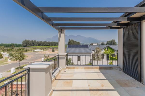 This newly built 5-bedroom ensuite home offers a timeless, classic design with modern amenities. The slate roof and exposed beams add ...