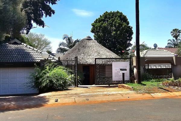 Large entertainment area. This spacious 5-bedroom home, located in Magalieskruin, above Braam Pretorius Road, is now for sale.   It ...