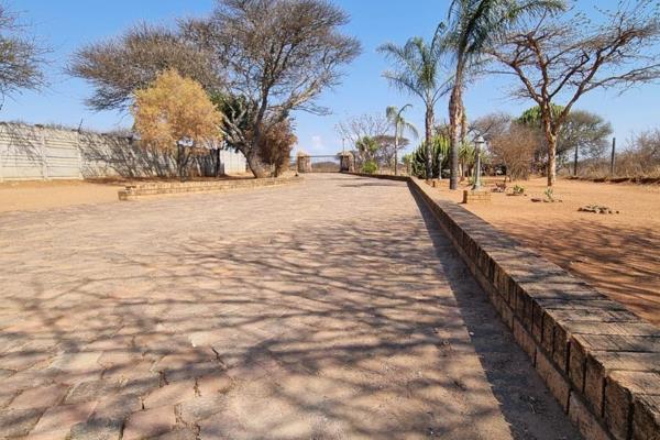 Country Living At It&#39;s Best Located Next To The R37 &amp; N1 Making Easy Access
The Property Has Four Houses Earning A Passive ...